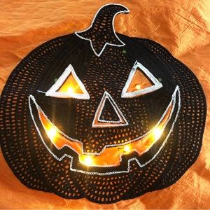 Jack-O-Lantern Light Up table Runner Size: 13”X 72”. Pier 1